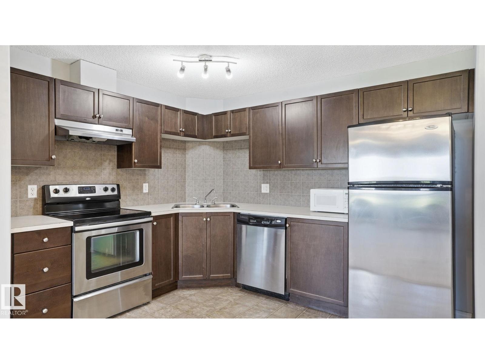 #7319 7327 SOUTH TERWILLEGAR DR NW - photo 4