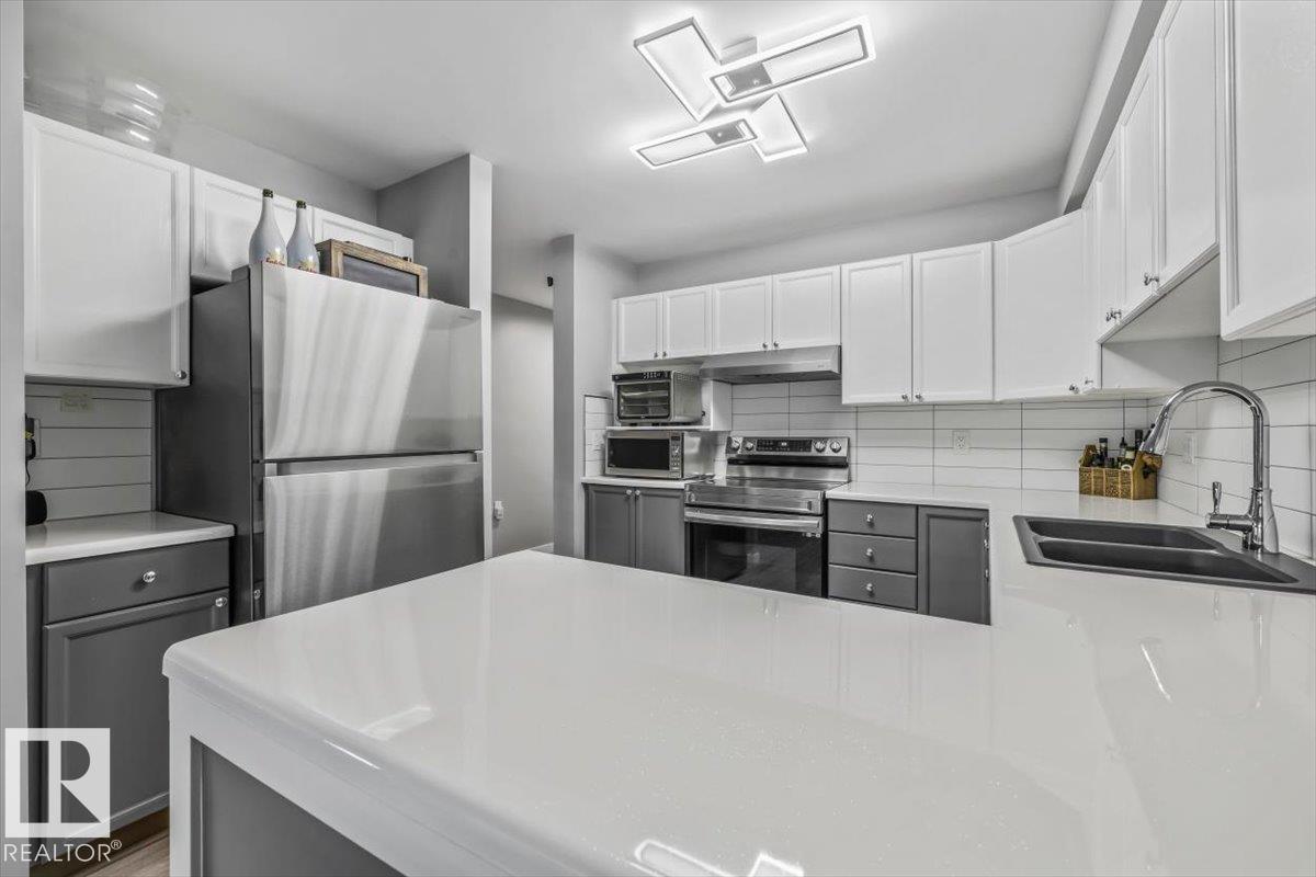 #129 15499 CASTLE DOWNS RD NW — photo 8