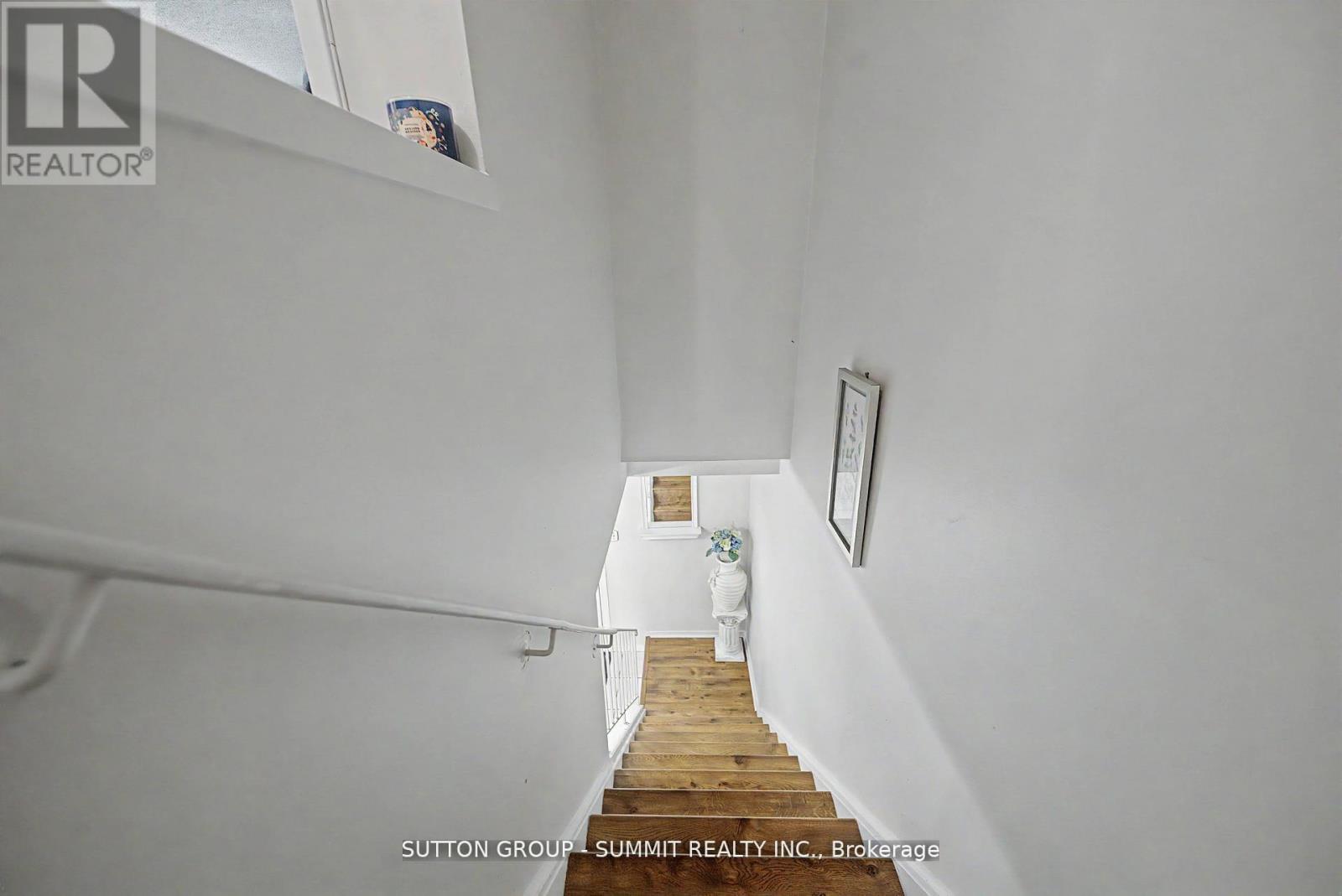 #61 45 HANSEN ROAD N - 14