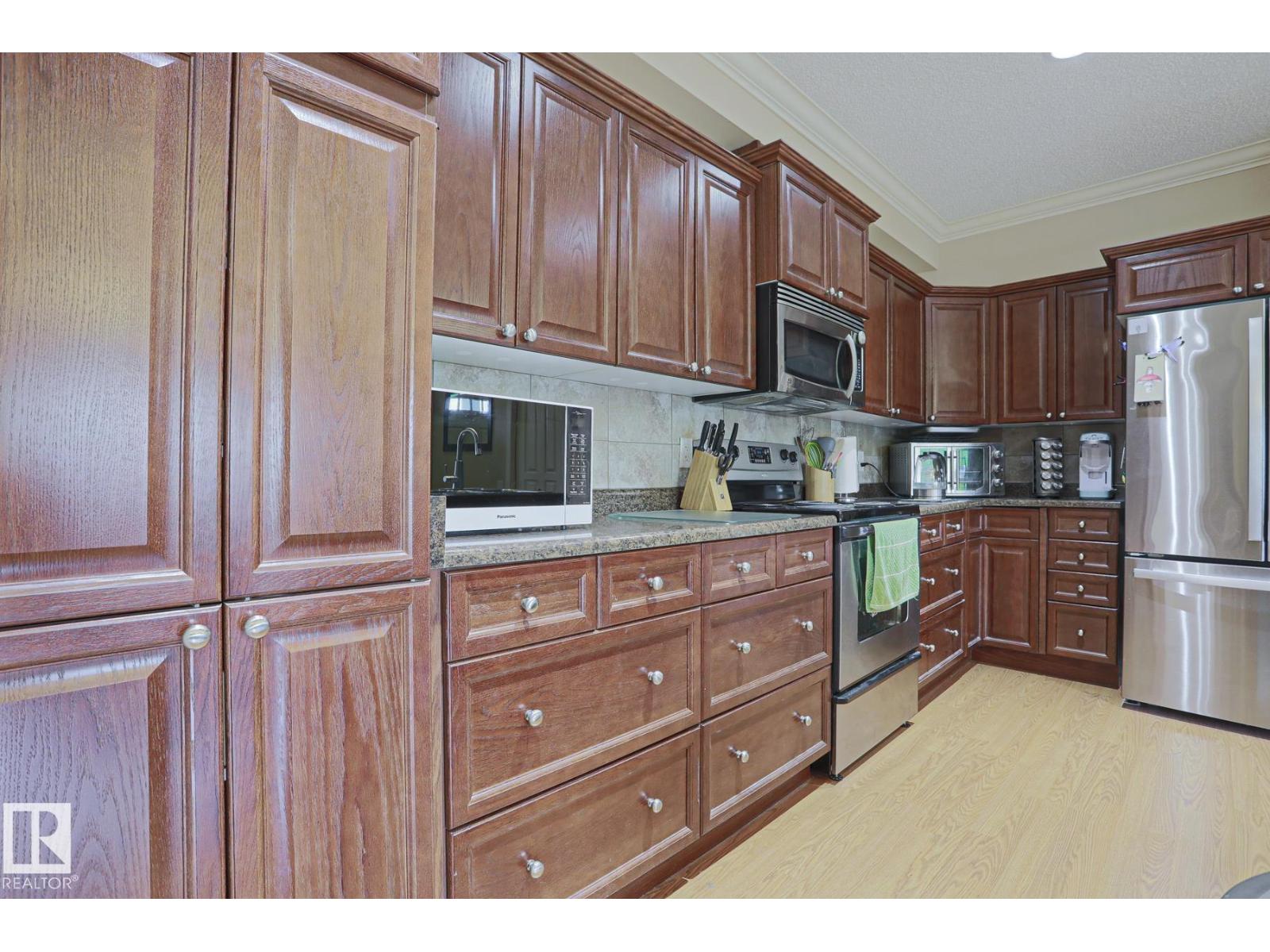 #13 7293 SOUTH TERWILLEGAR DR NW — photo 14