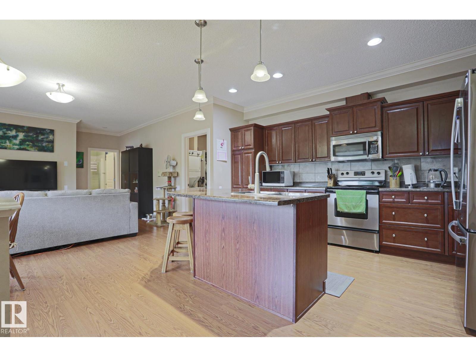 #13 7293 SOUTH TERWILLEGAR DR NW — photo 20