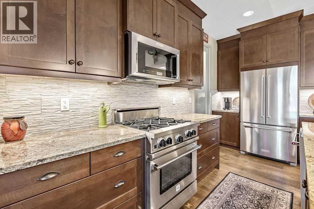 Professional grade BlueStar gas stove. Coffee station keeps everything tucked away but easily at hand