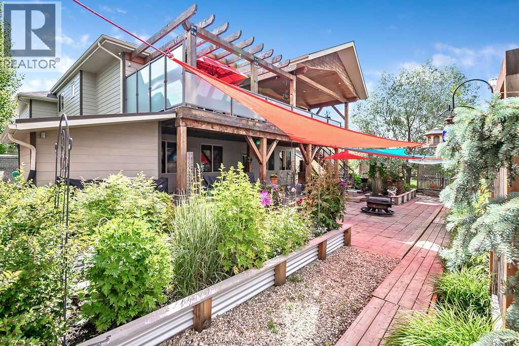 Stone pathways and raised gardens offer a blend of beauty and function