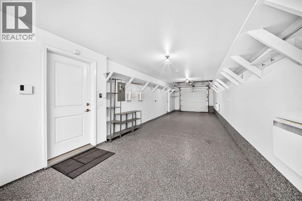 38 Foot Long Garage with Epoxy Floor - A perfect home for 2 SUV's, a workshop or home gym!