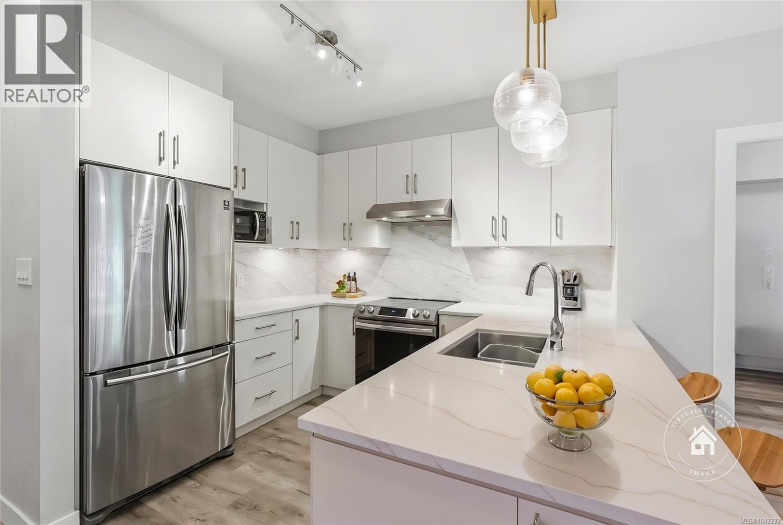 #308 20 Barsby Ave - 1