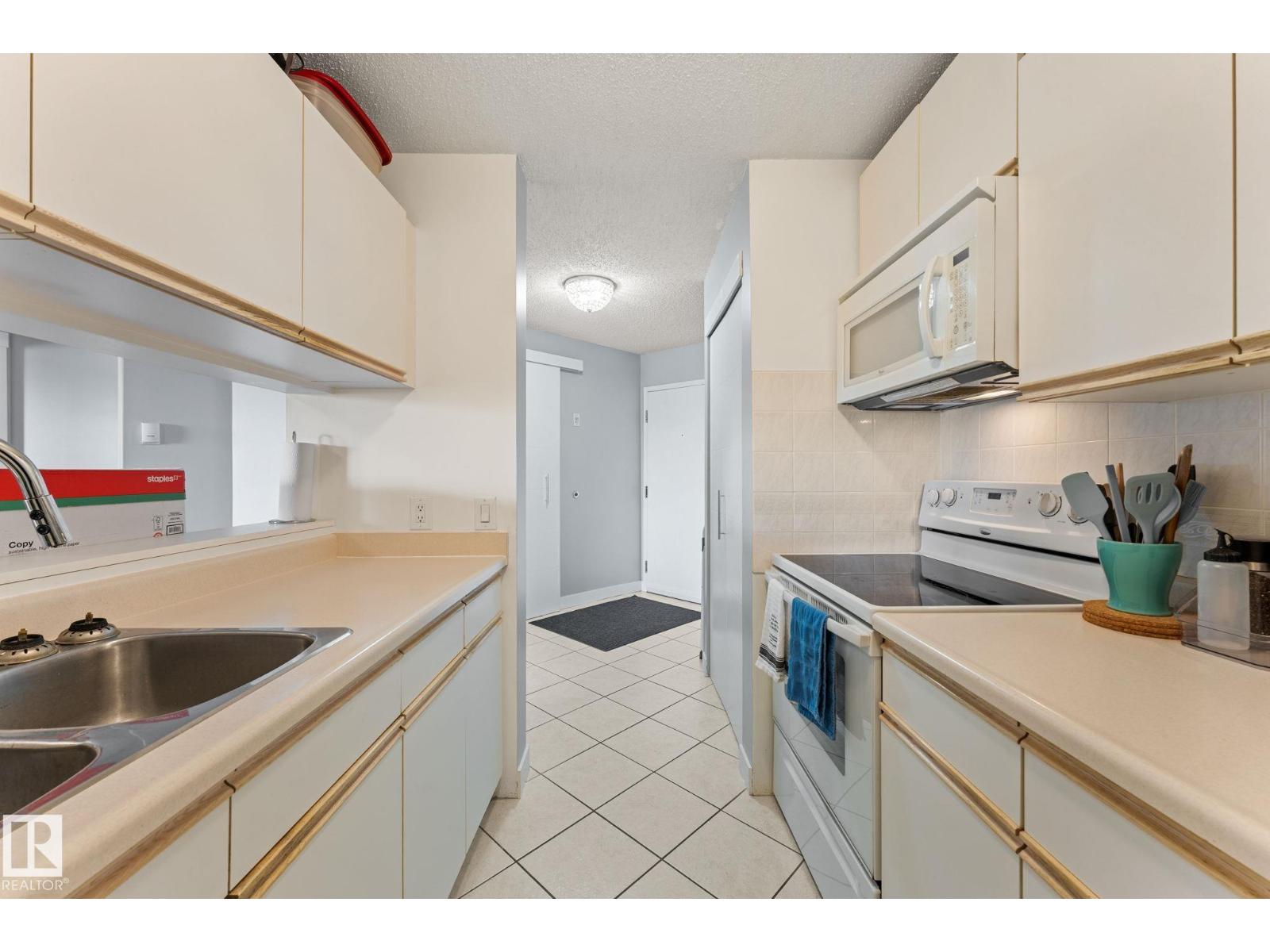 #208 6710 158 AV NW - 1