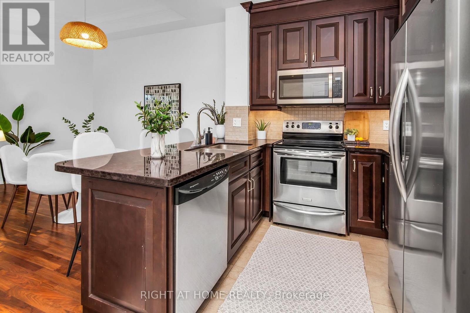 #306 20 BURKEBROOK PLACE - 8