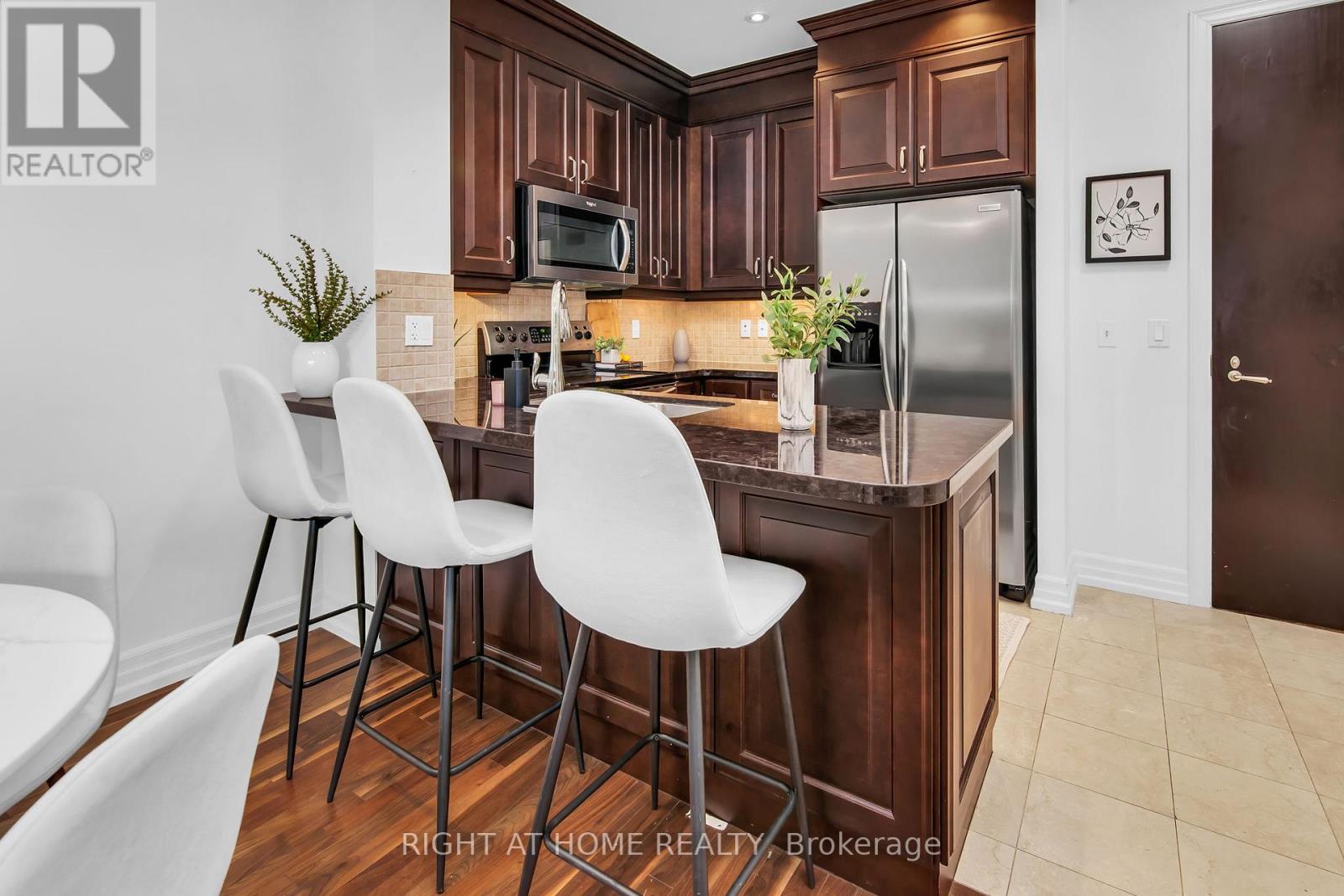 #306 20 BURKEBROOK PLACE - 9