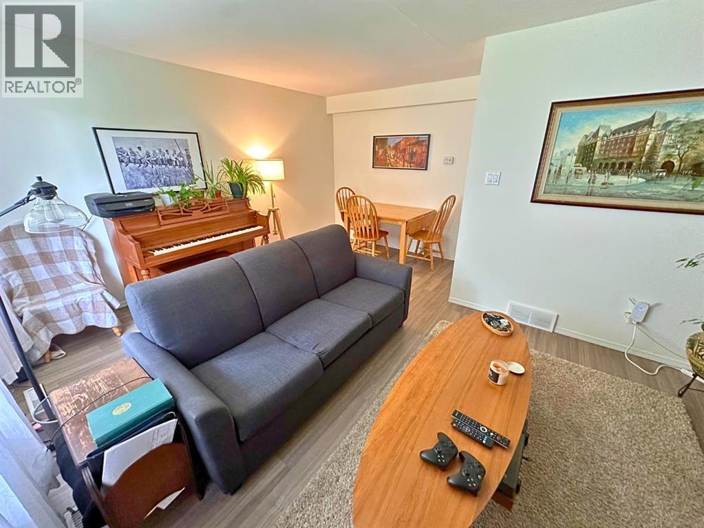 #302, 4719 33 Street - 7