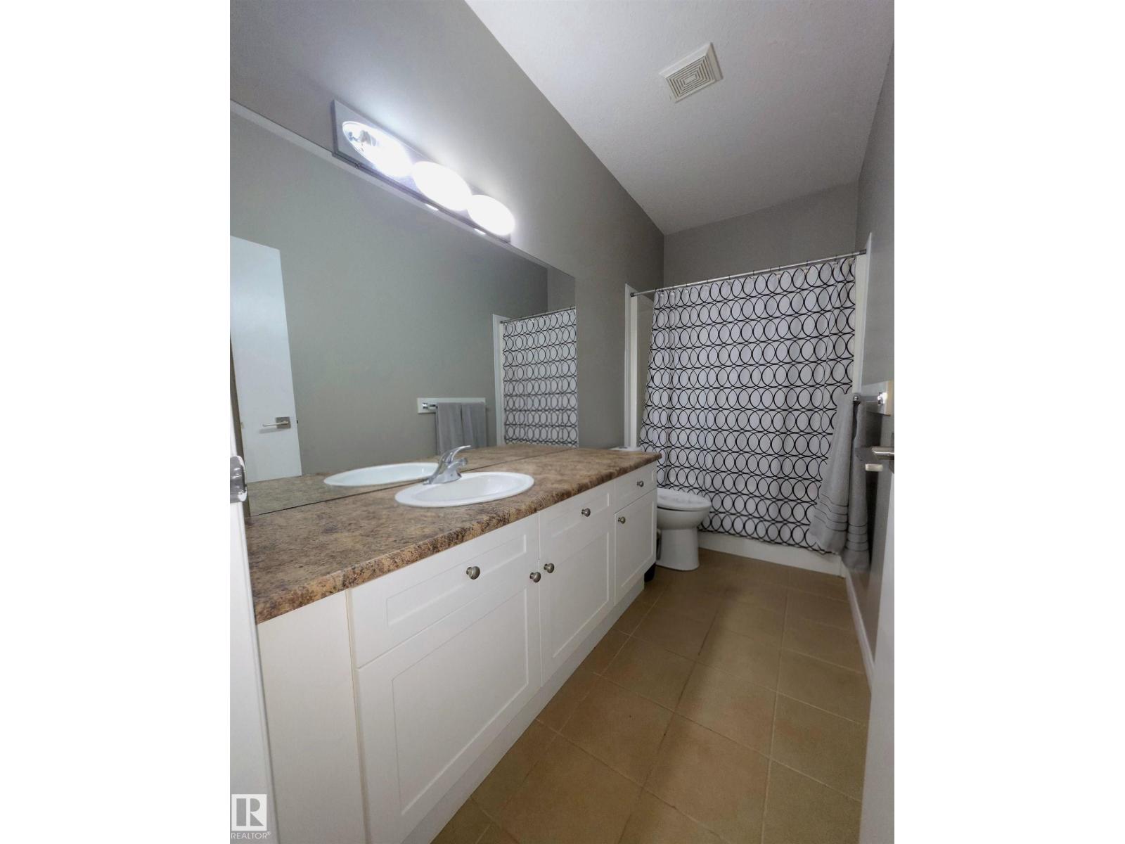 #104 4312 139 AV NW - 23