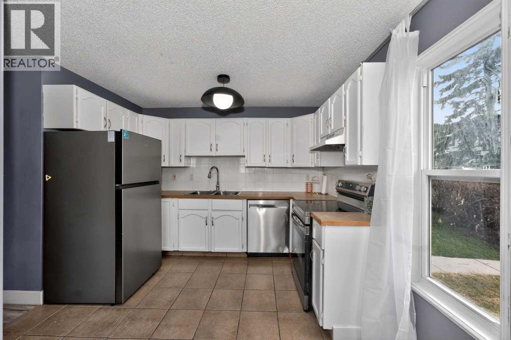 #7 75 Templemont Way NE - 14
