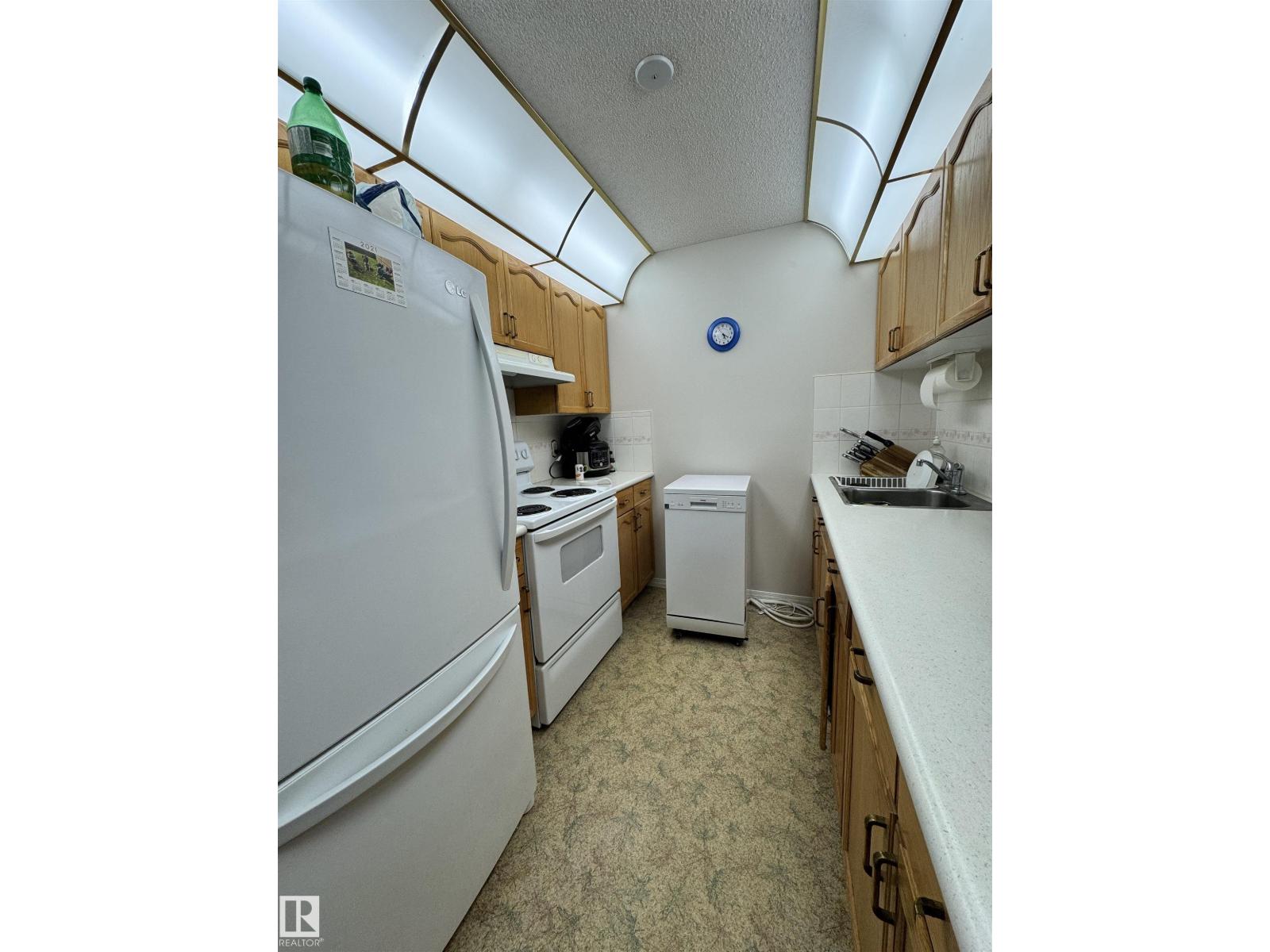#207 18012 95 AV NW - 19