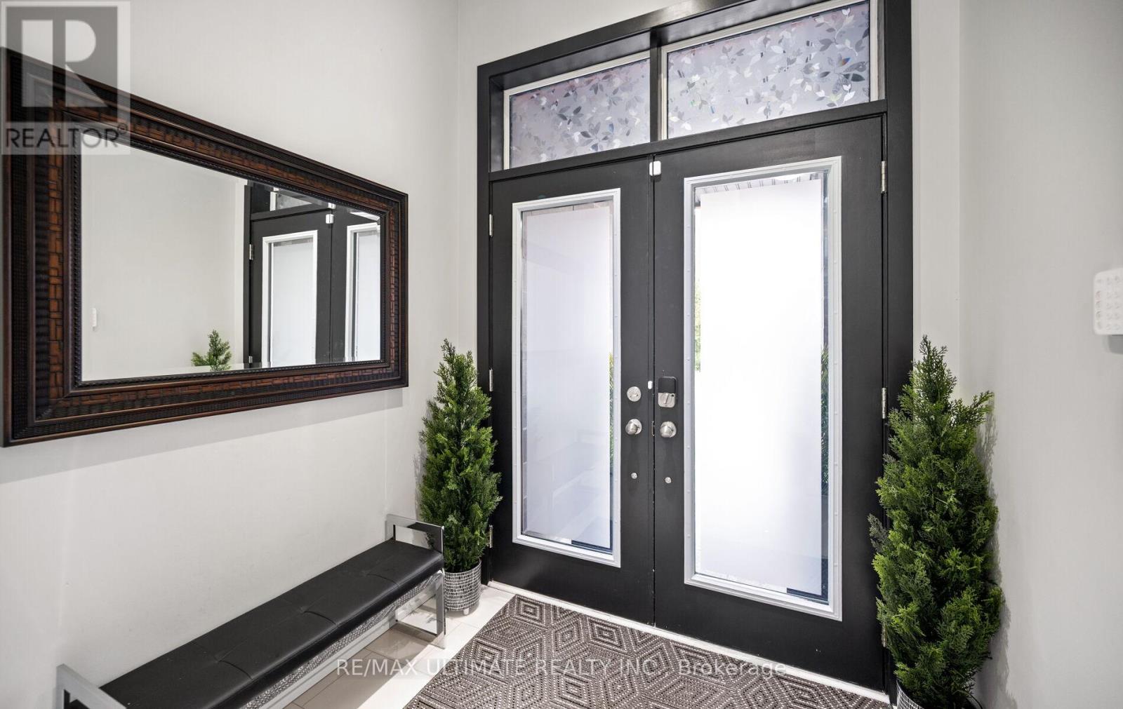 Double doors and spacious foyer