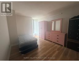Bedroom 2 - 2028 - 75 Bamburgh Circle, Toronto, ON M1W3W1 Photo 6