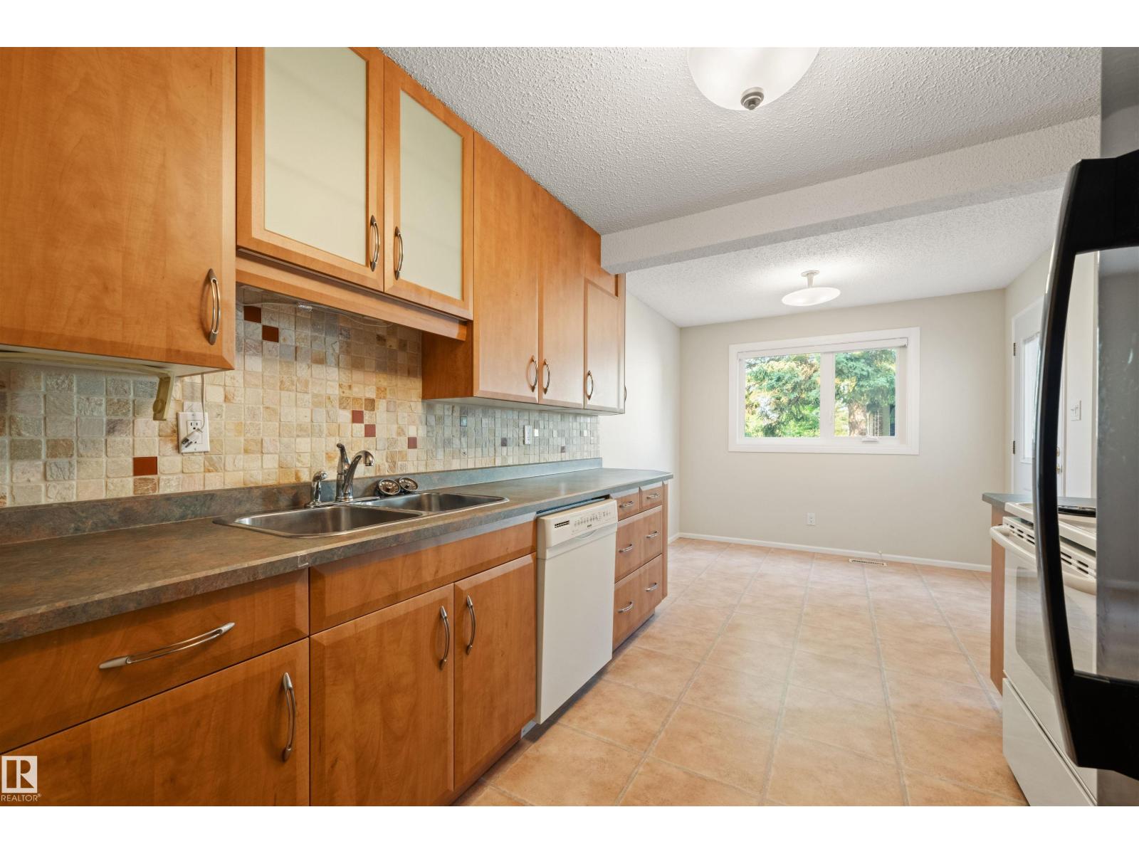 #31 11111 26 AV NW - 9