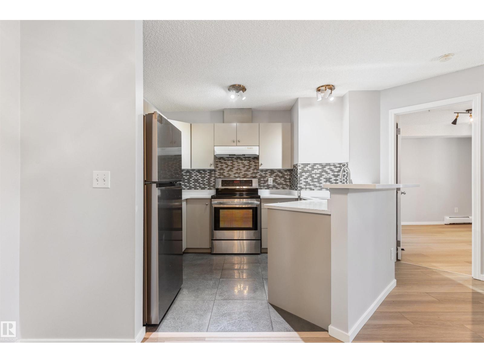 #112 11214 80 ST NW - 11