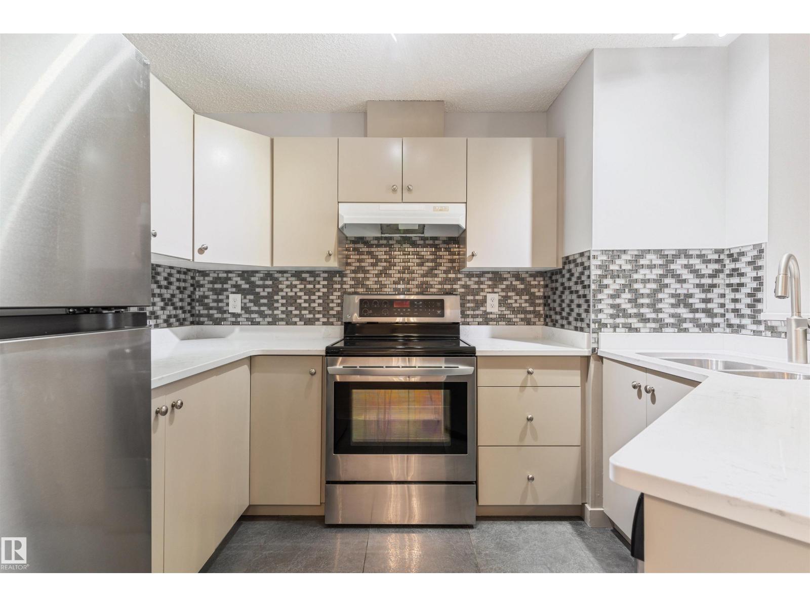#112 11214 80 ST NW - 12