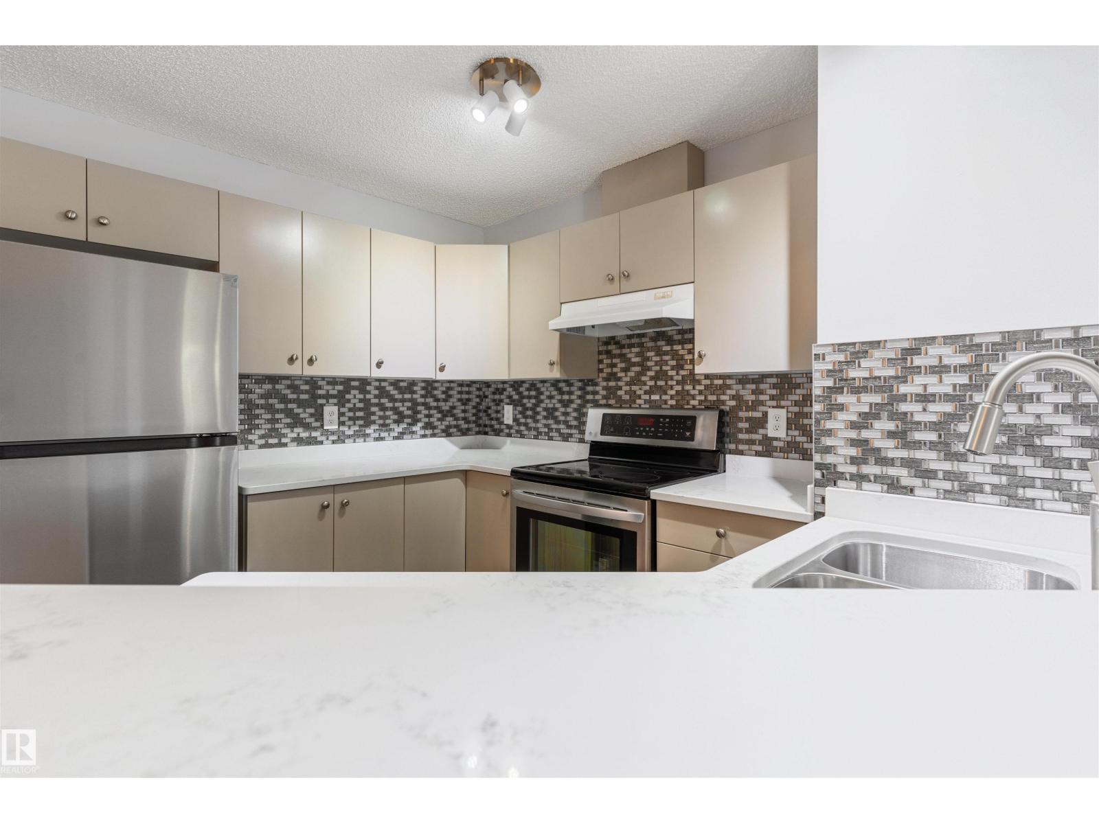 #112 11214 80 ST NW - 14