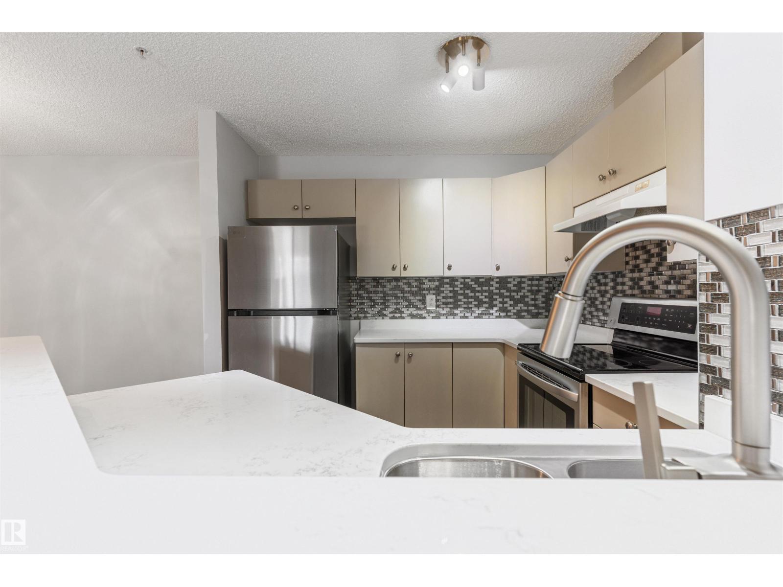 #112 11214 80 ST NW - 15