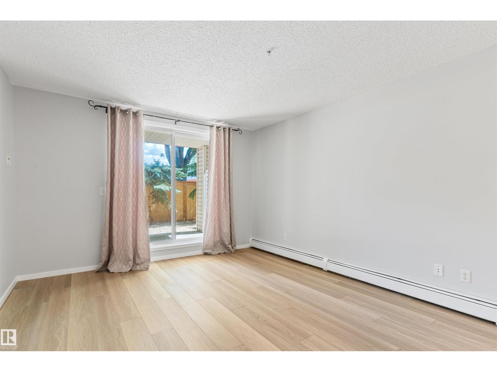 #112 11214 80 ST NW - 18