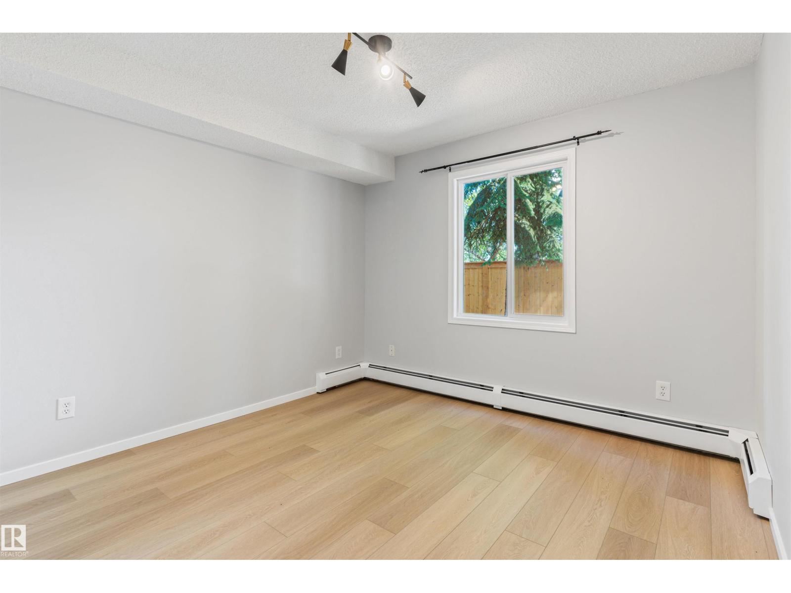 #112 11214 80 ST NW - 23