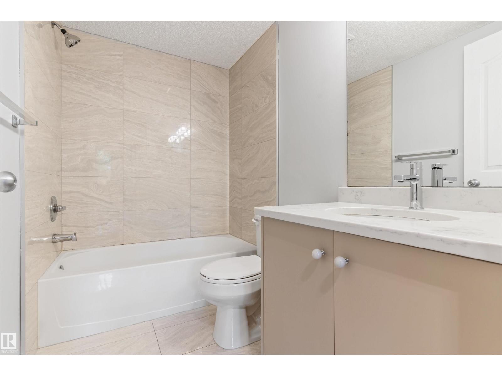 #112 11214 80 ST NW - 27