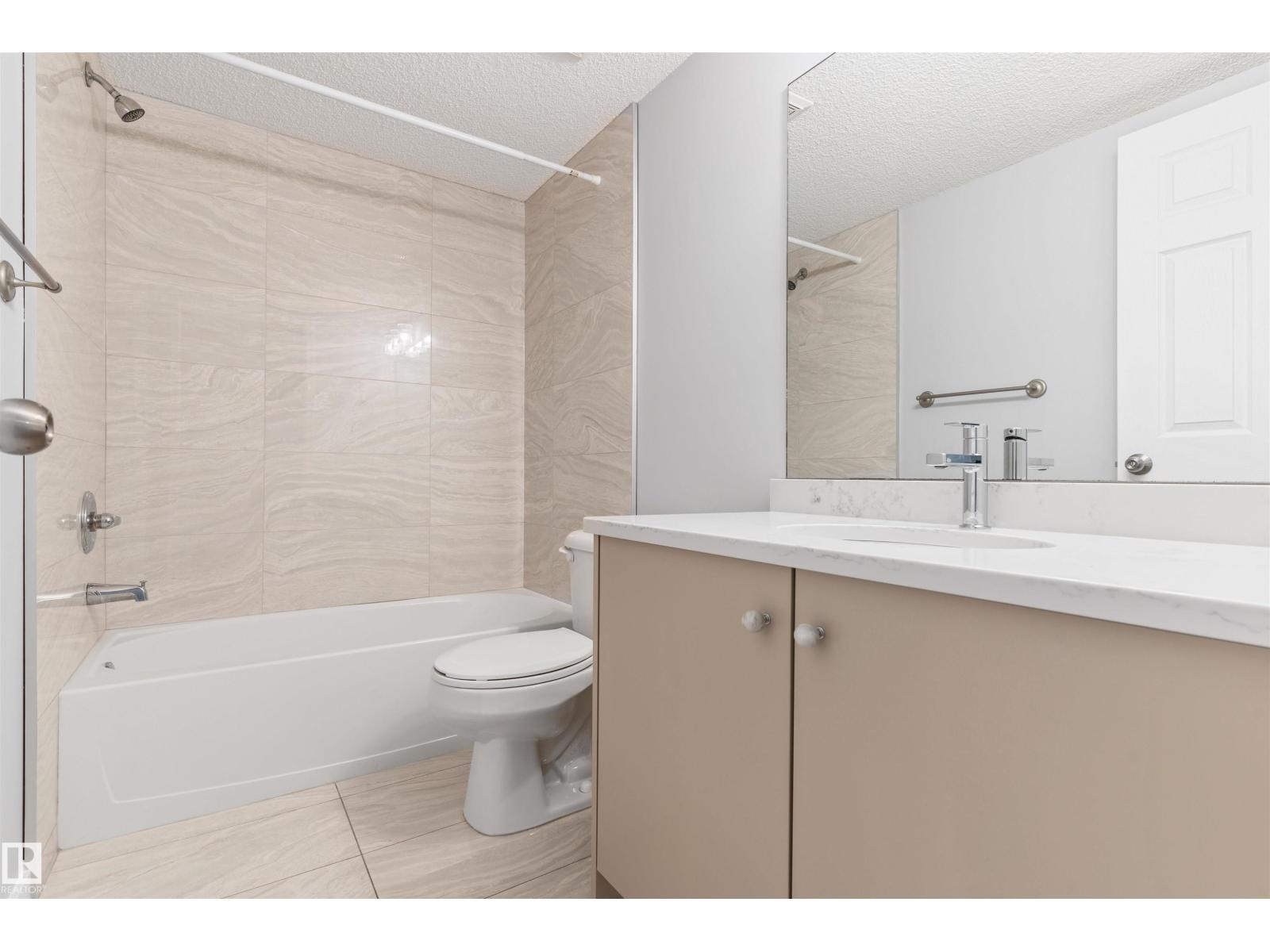 #112 11214 80 ST NW - 32