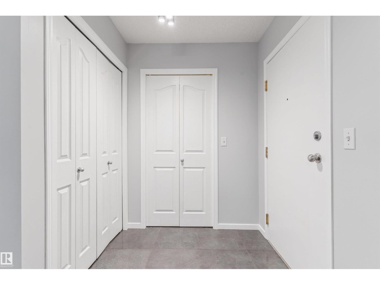 #112 11214 80 ST NW - 4