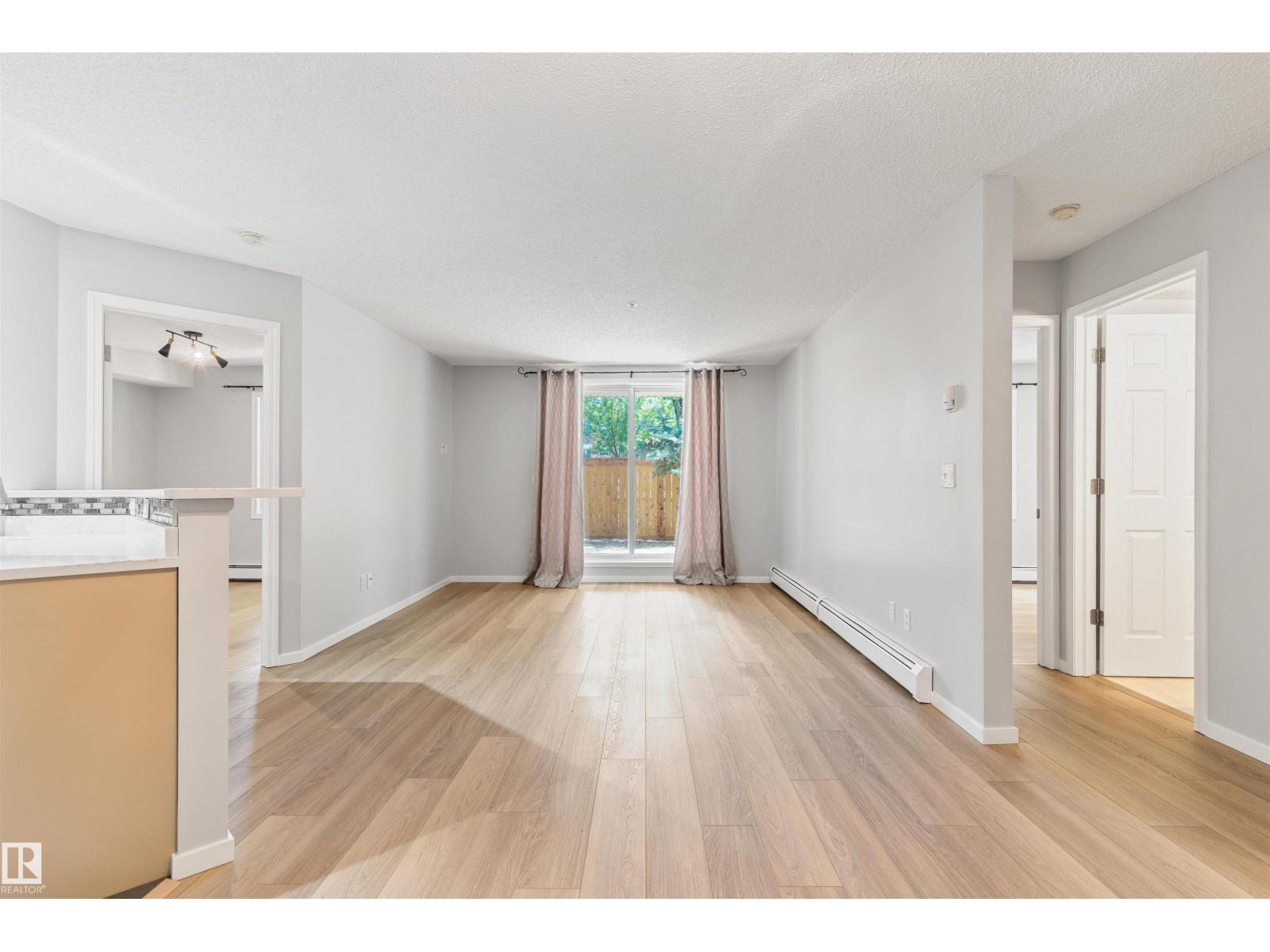 #112 11214 80 ST NW - 8