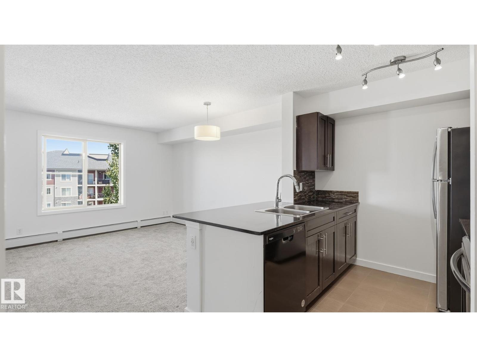 #415 12035 22 AV SW - 2