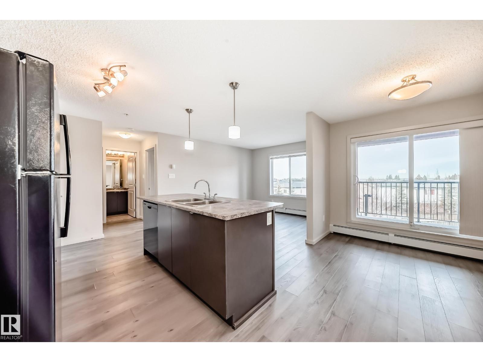 #332 344 WINDERMERE RD NW - 6
