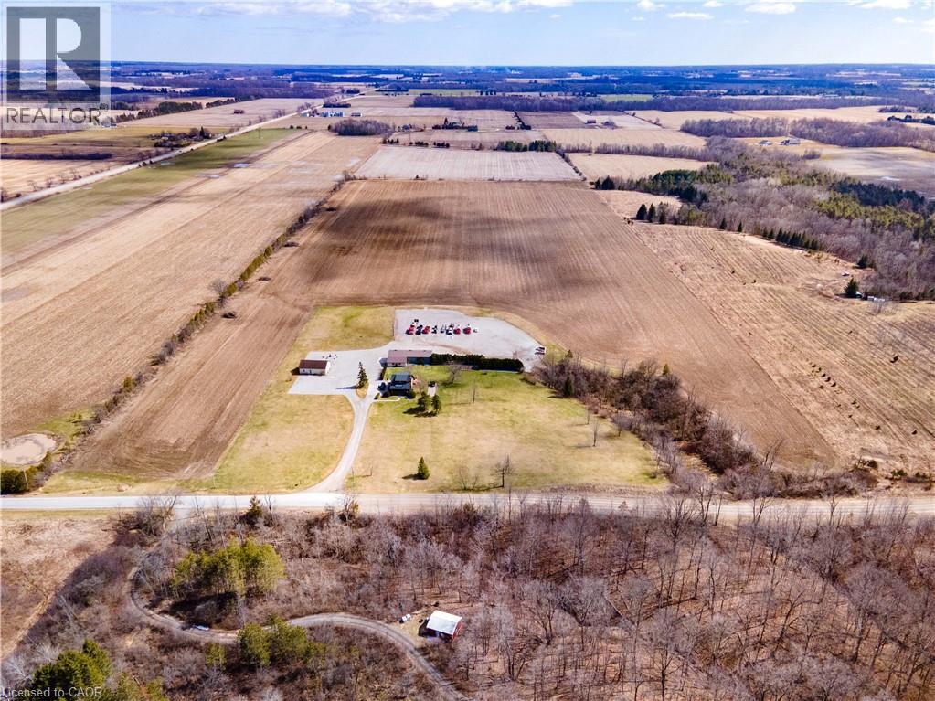 Aerial view of sparsely populated area with farmland