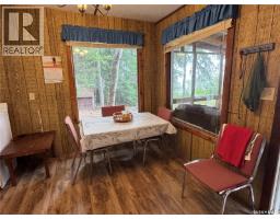 Living room - Lac La Ronge Cabin Near Potato Point, Northern Admin District, SK S0J1L0 Photo 6