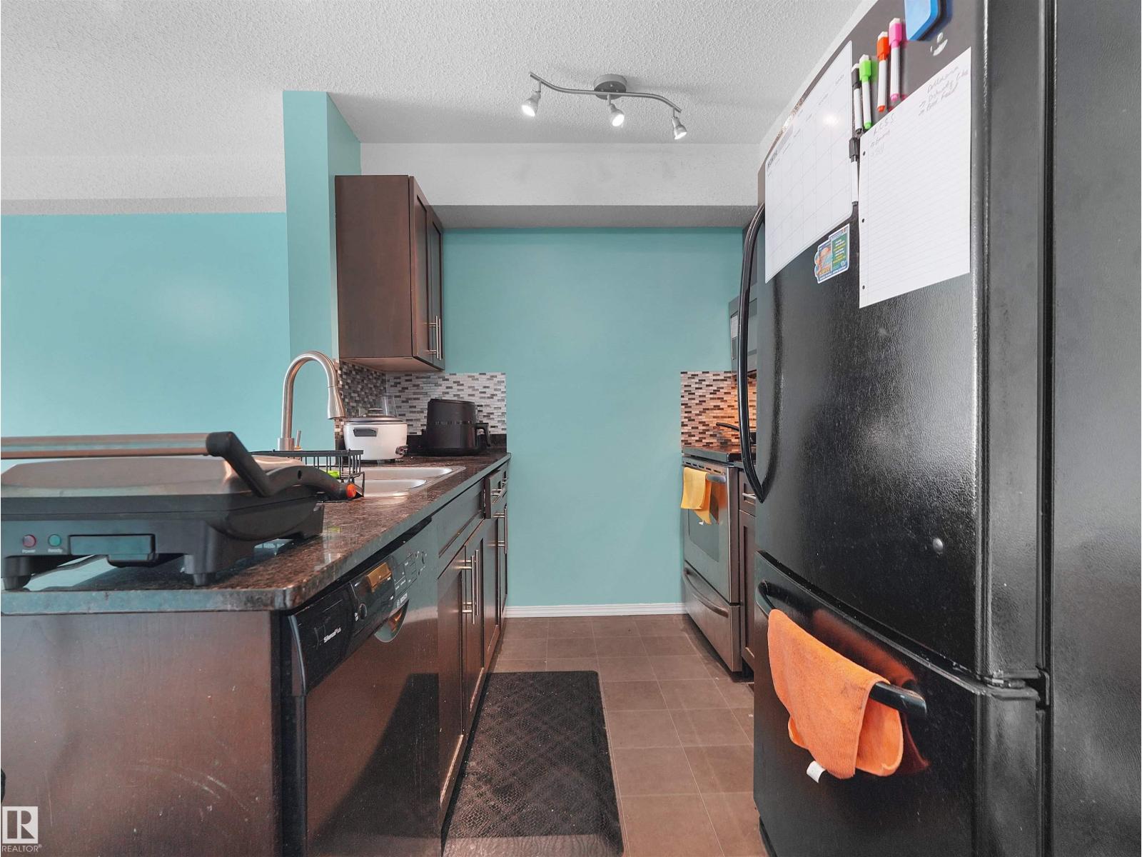 #313 11820 22 AV SW - 25
