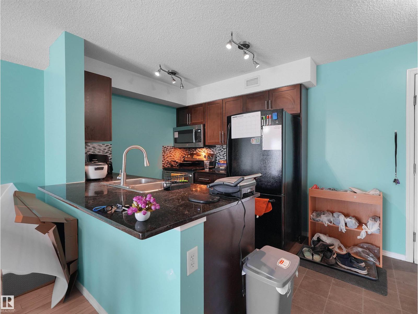 #313 11820 22 AV SW - 24