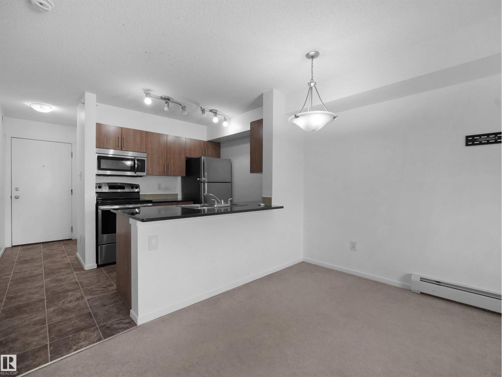 #410 18122 77 ST NW - 23