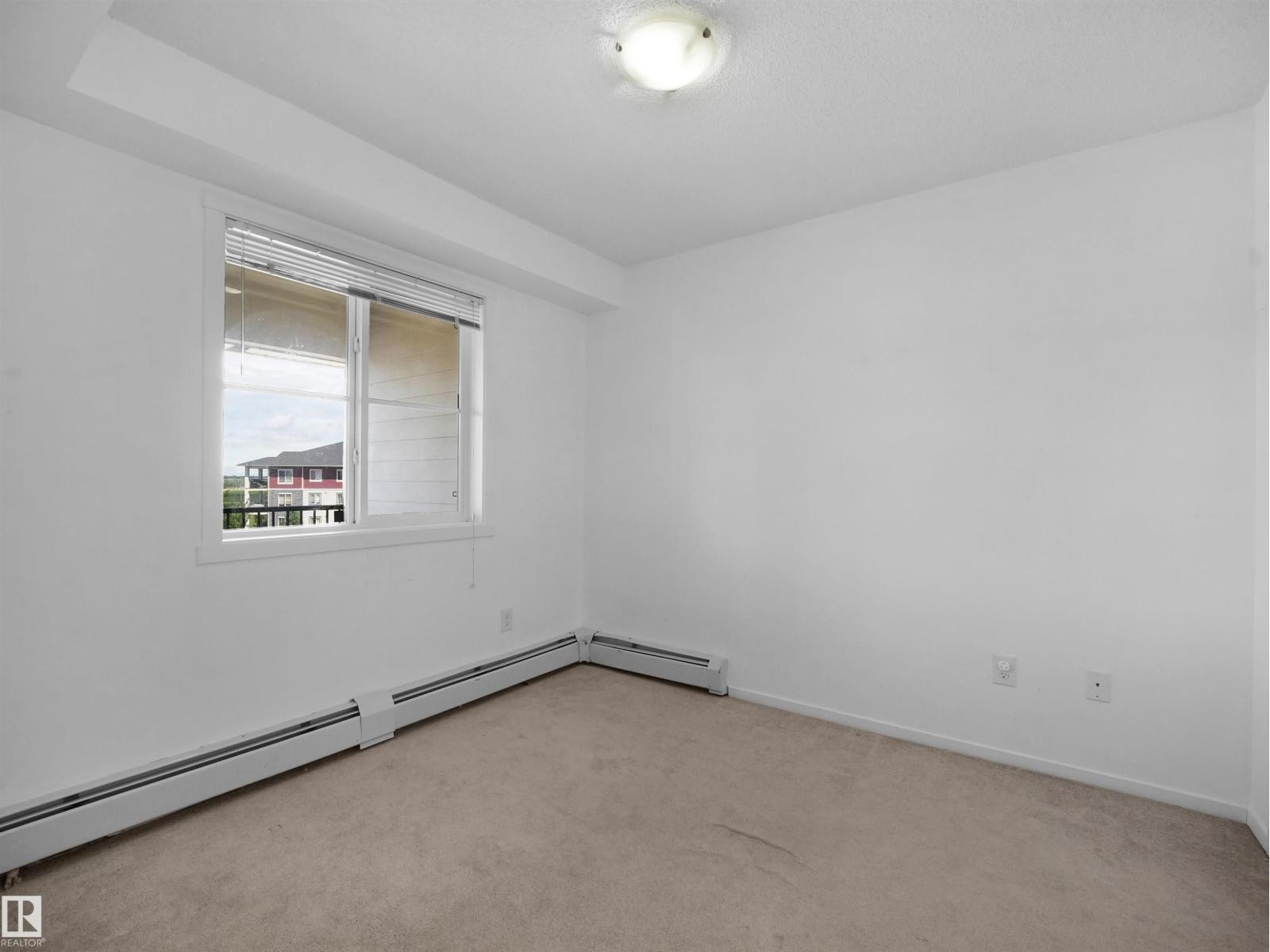 #410 18122 77 ST NW - 25