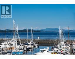 Living room - 201 9949 Third St, Sidney, BC V8L3B1 Photo 11
