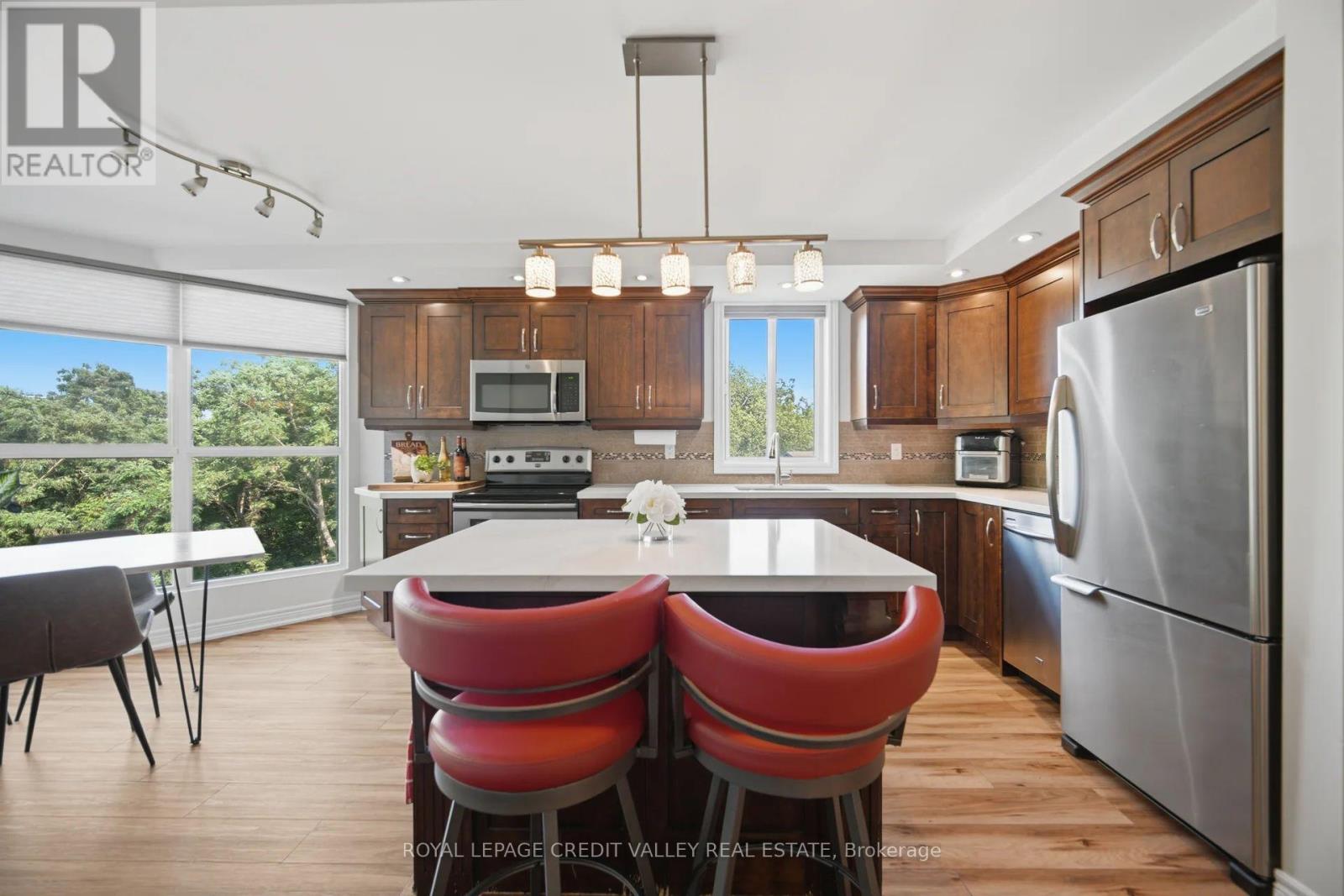 #407 8351 MCLAUGHLIN ROAD E - 17