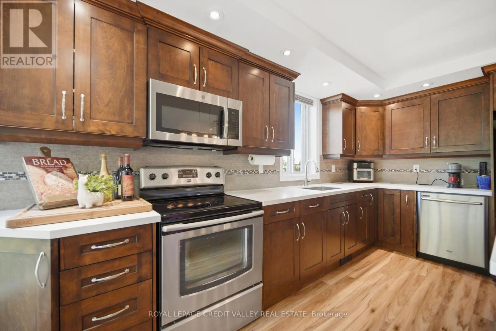 #407 8351 MCLAUGHLIN ROAD E - 19