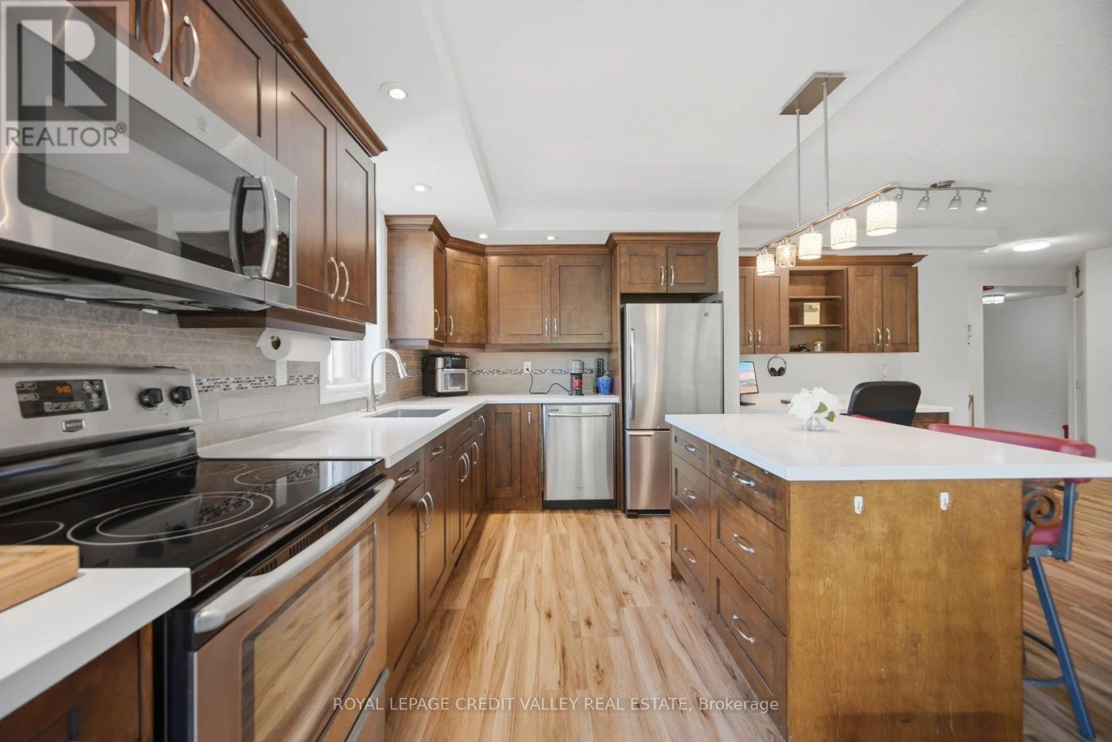 #407 8351 MCLAUGHLIN ROAD E - 20