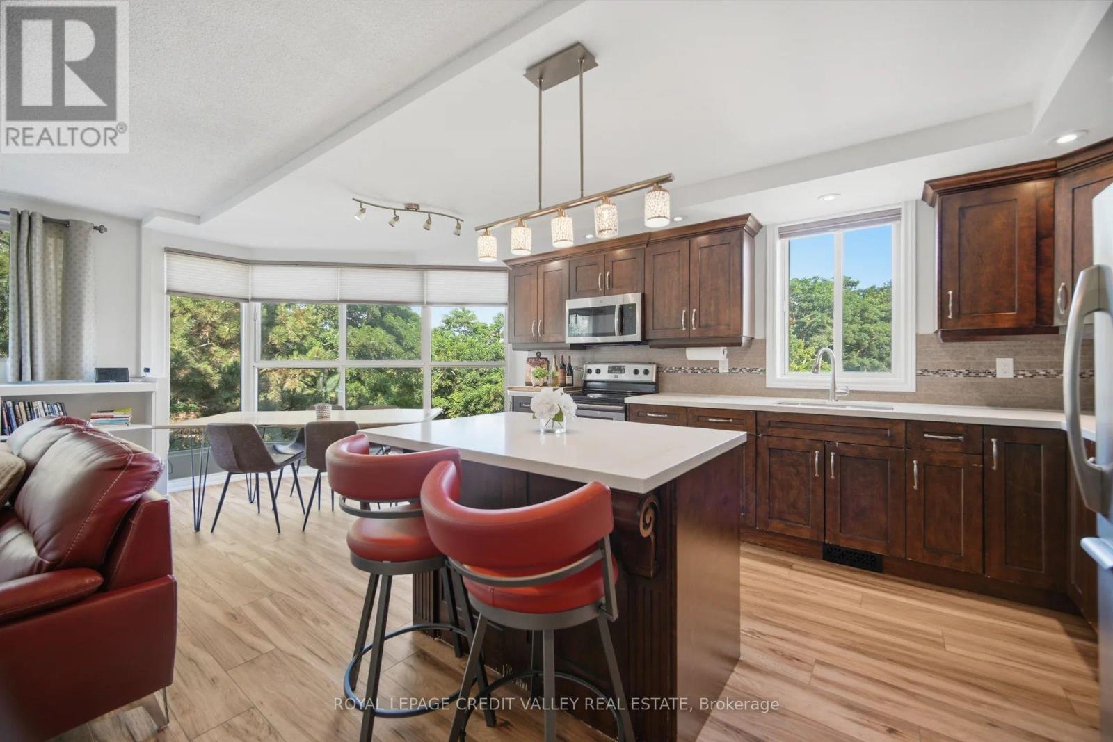 #407 8351 MCLAUGHLIN ROAD E - 21