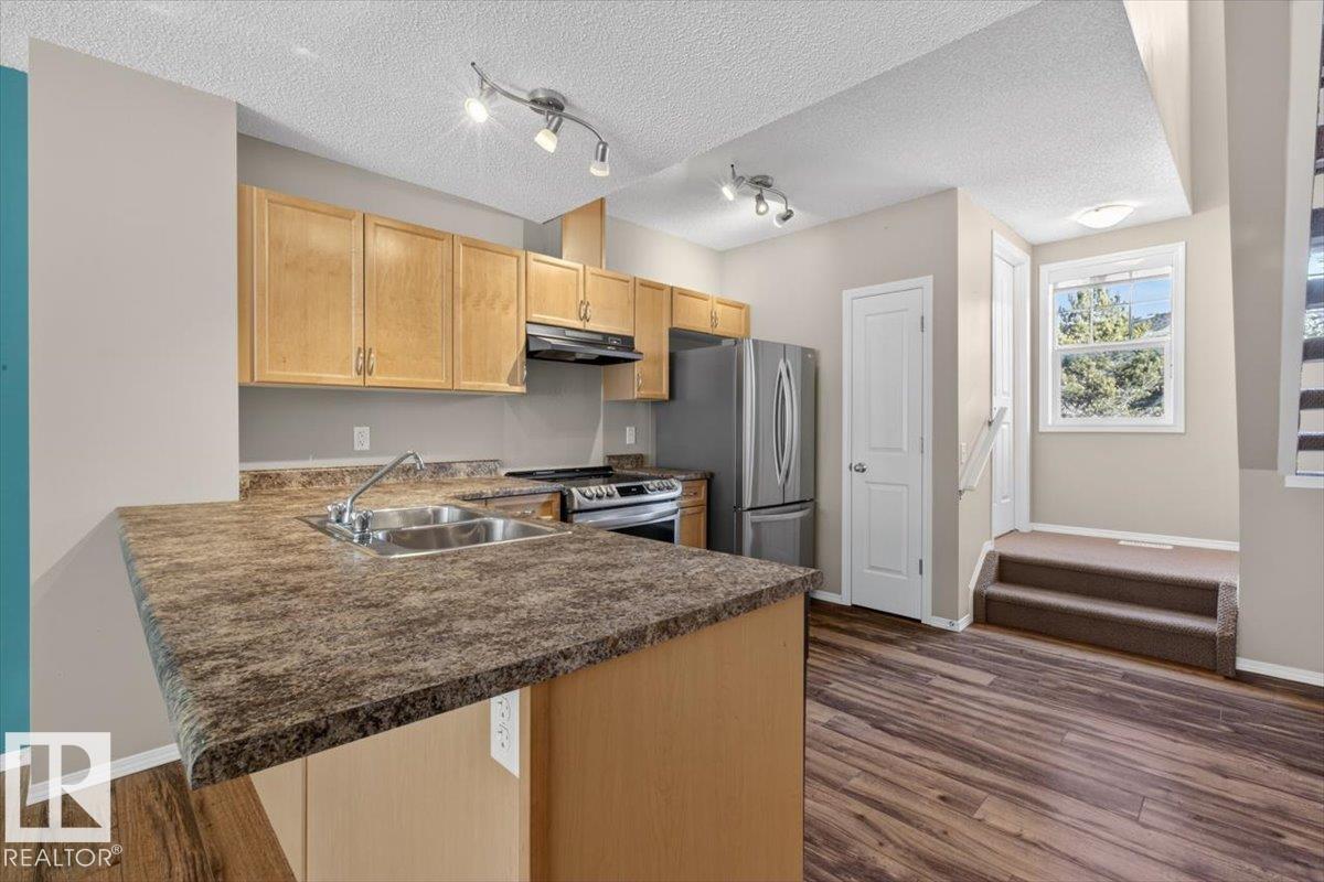 #130 5604 199 ST NW - 11