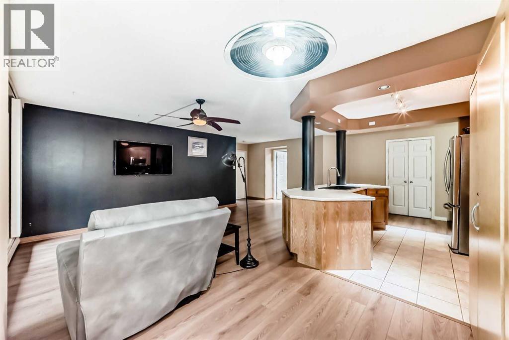 #208 659 4 Avenue NE - 18