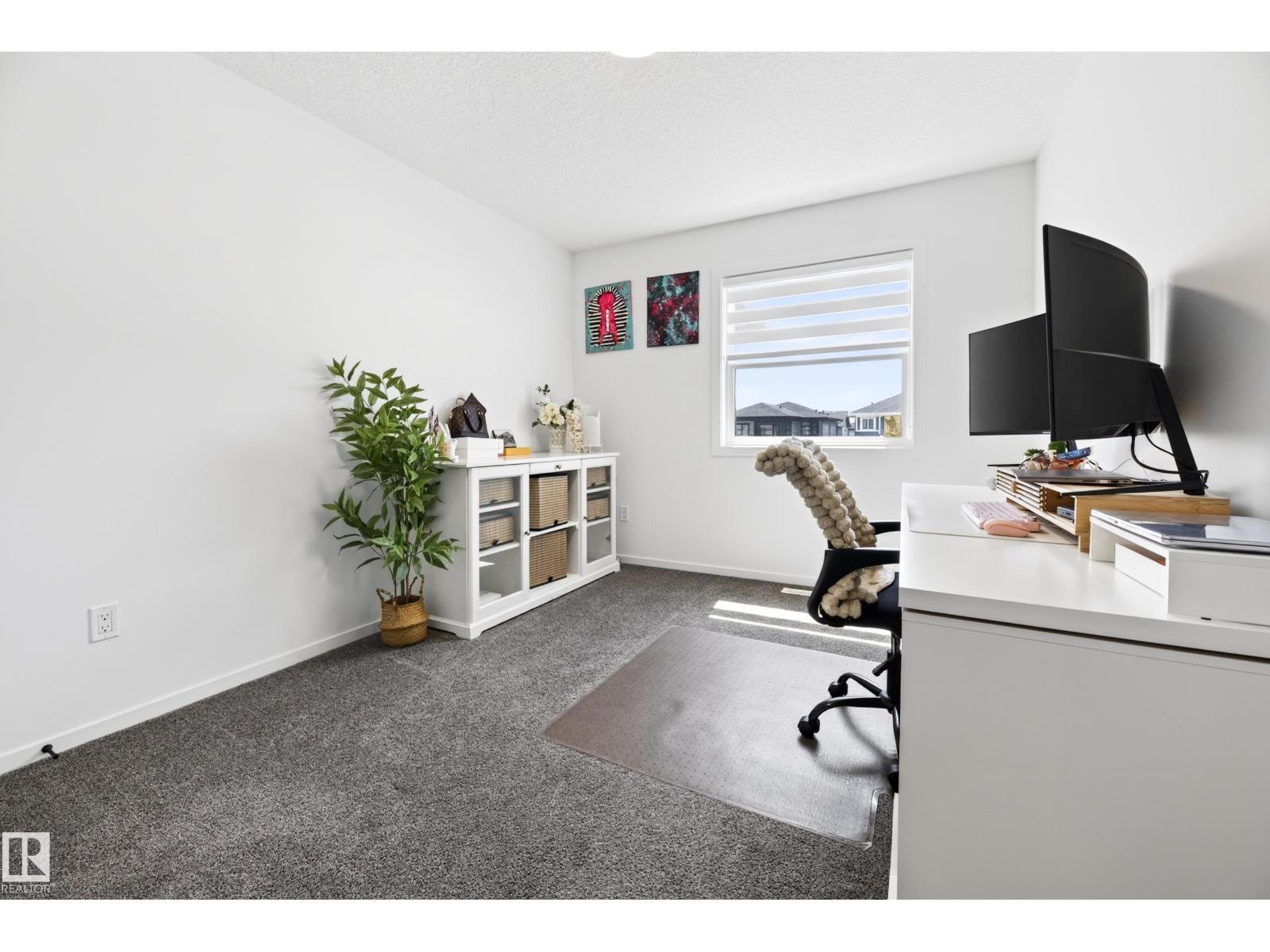 8038 174A AV NW — photo 31