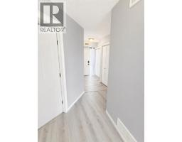 Living room - 323, 103 Strathaven Drive E, Strathmore, AB T1P1W3 Photo 6