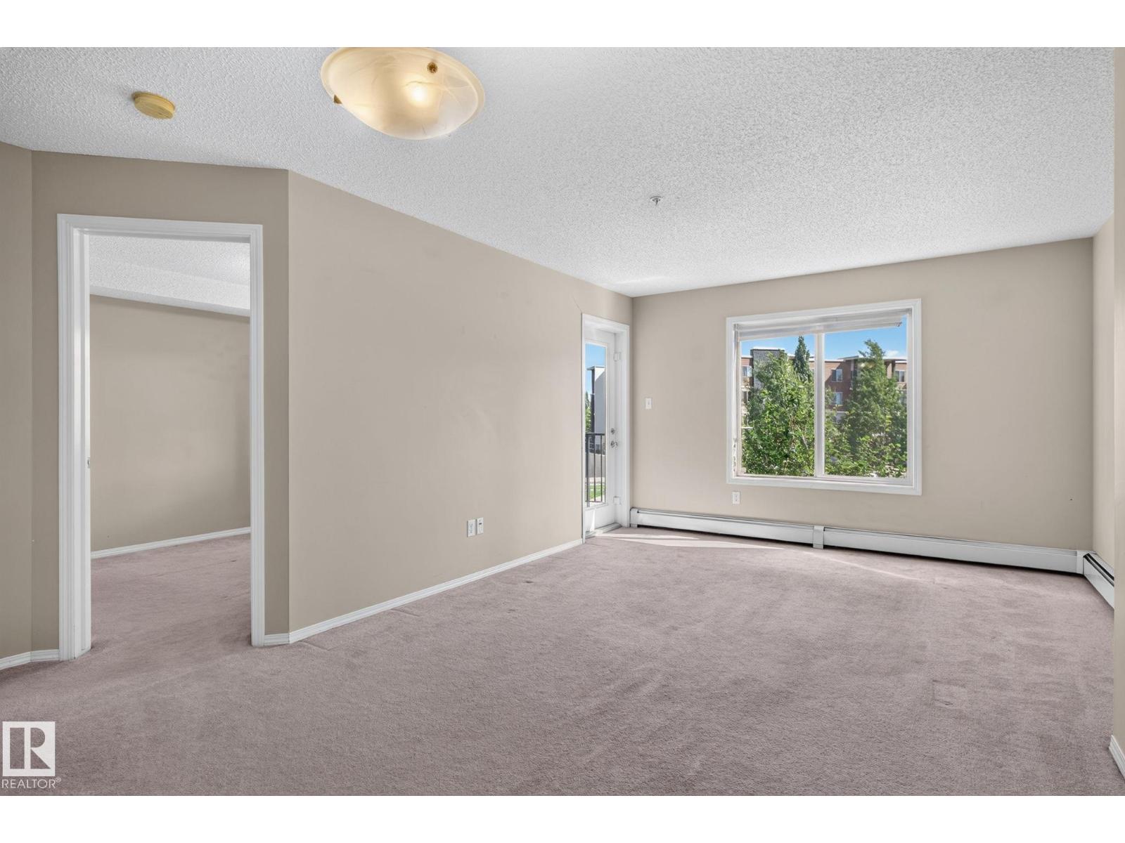 #205 11816 22 AV SW - 22