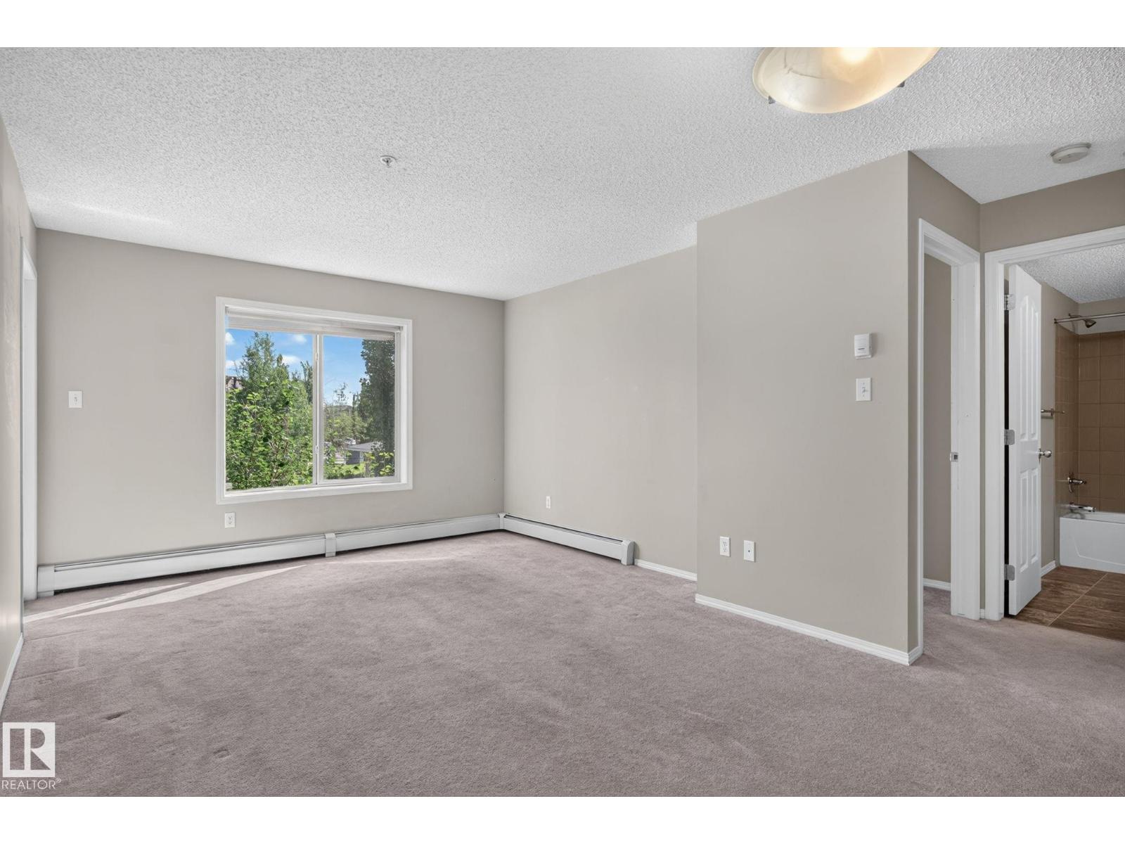 #205 11816 22 AV SW - 23