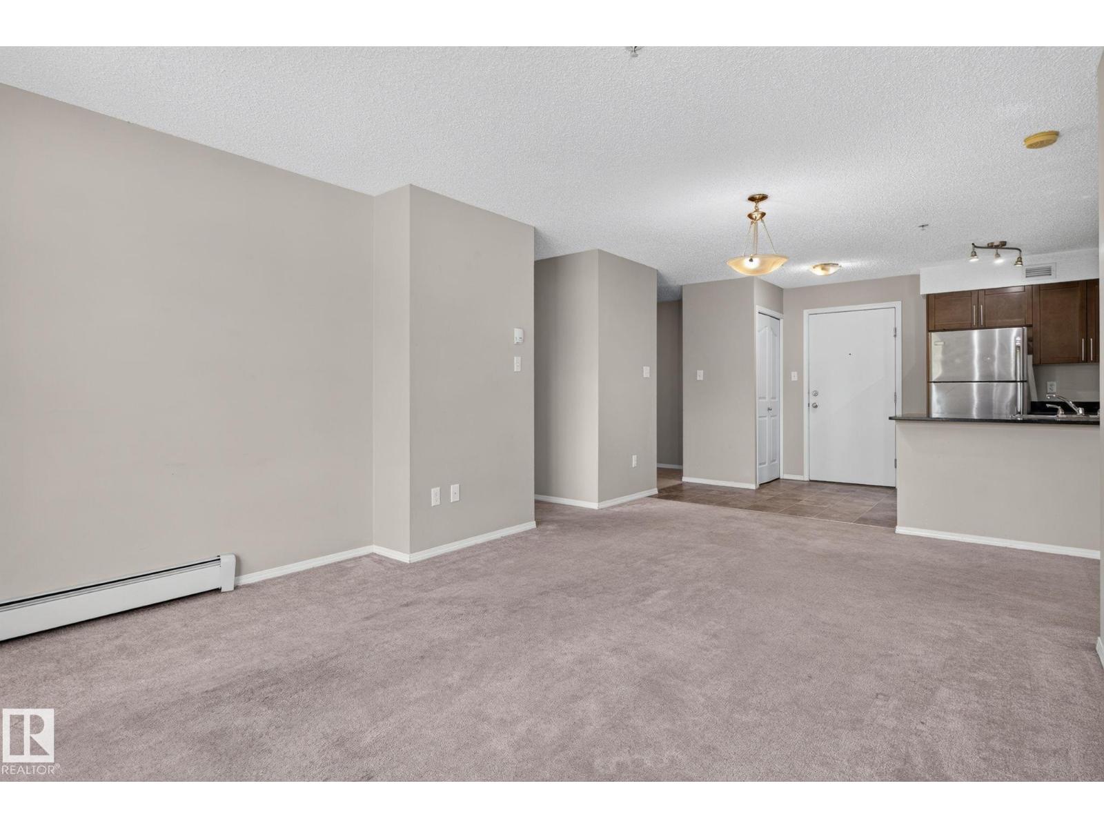 #205 11816 22 AV SW - 24
