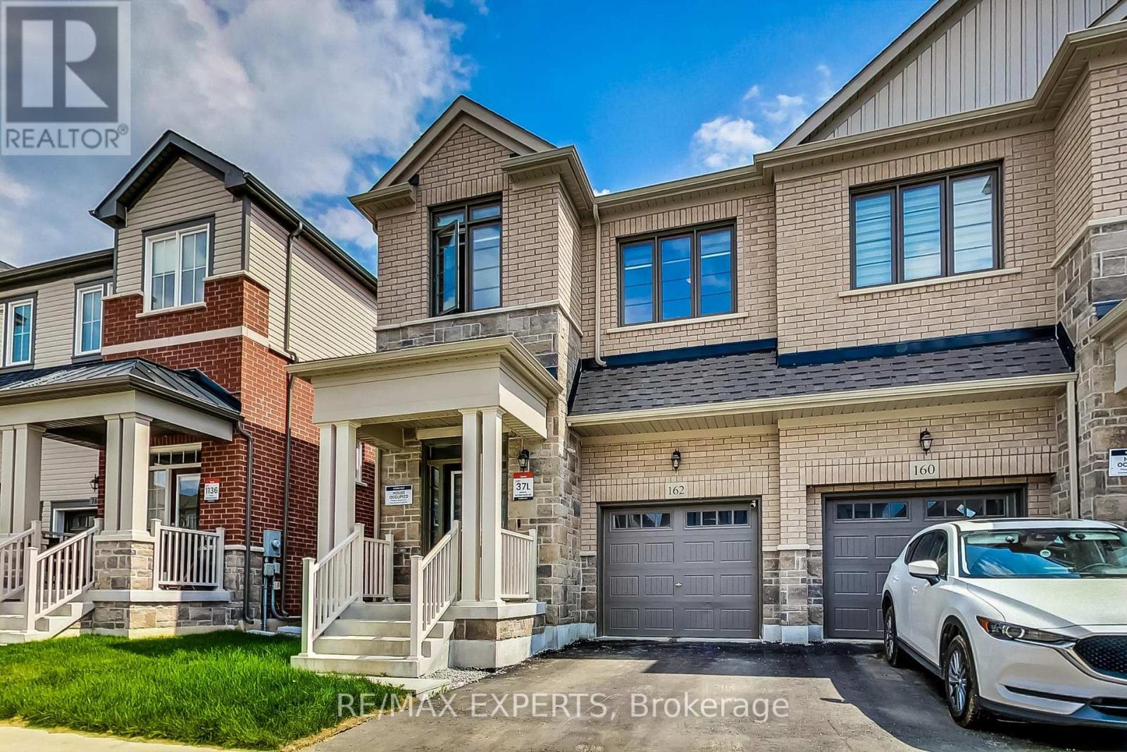 Garage + 1 drive way space